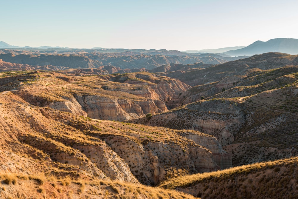 brown and gray mountains under blue sky during daytime