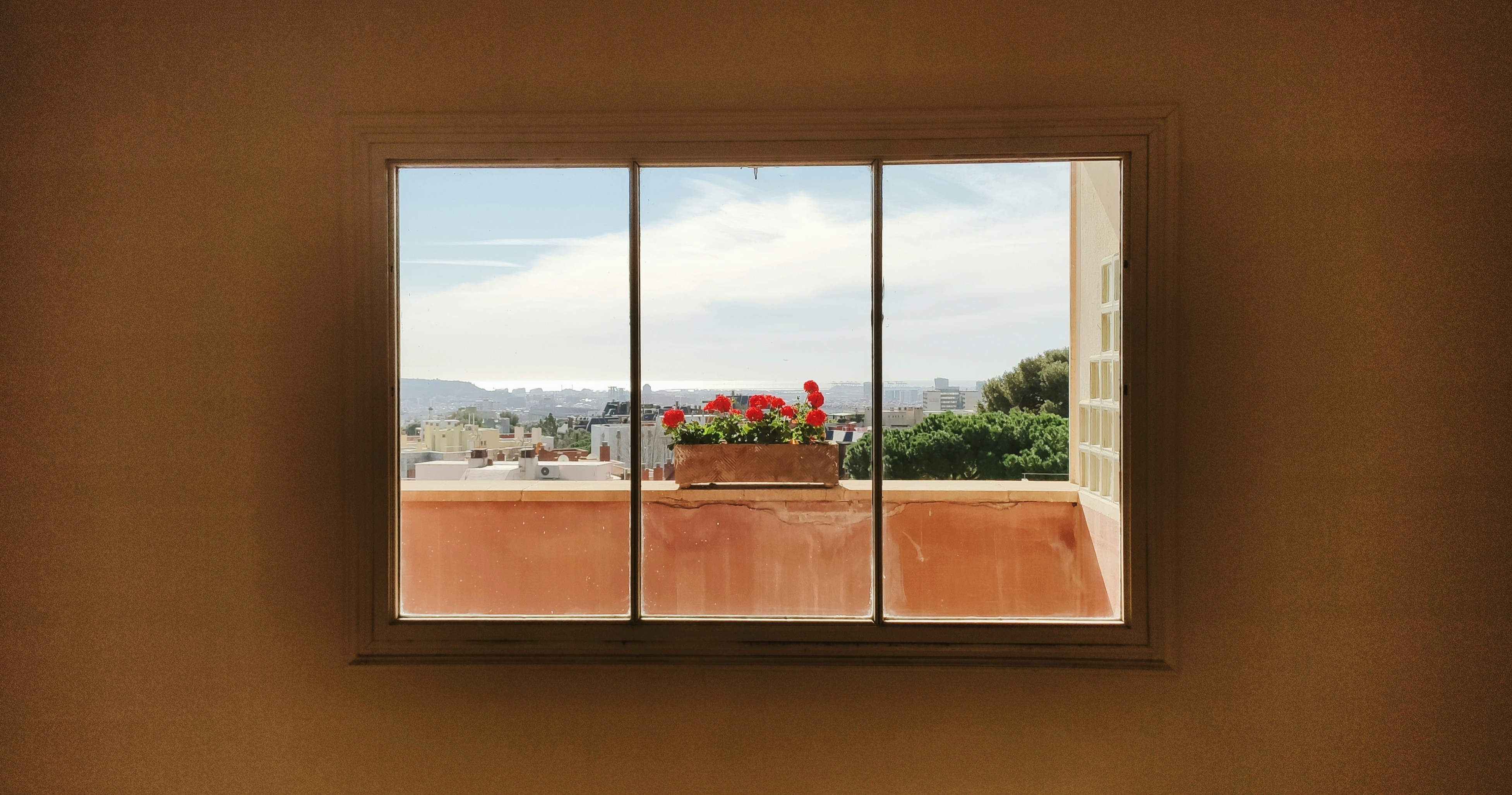 brown wooden framed glass window