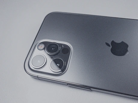 A sleek smartphone and camera setup used by an Indian influencer in Saudi Arabia.