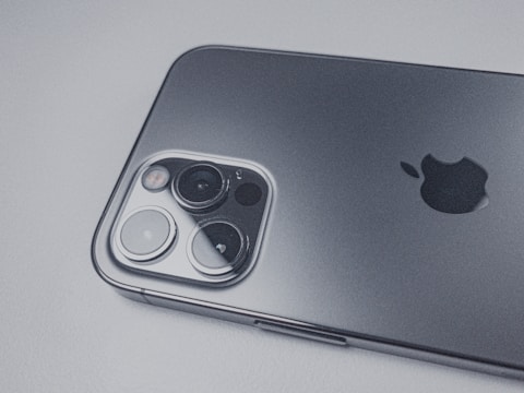 A sleek smartphone displaying a clean, modern app interface with AI-powered vision features.