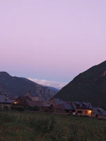 A serene sunrise over a quiet village, highlighting the charm of local life.