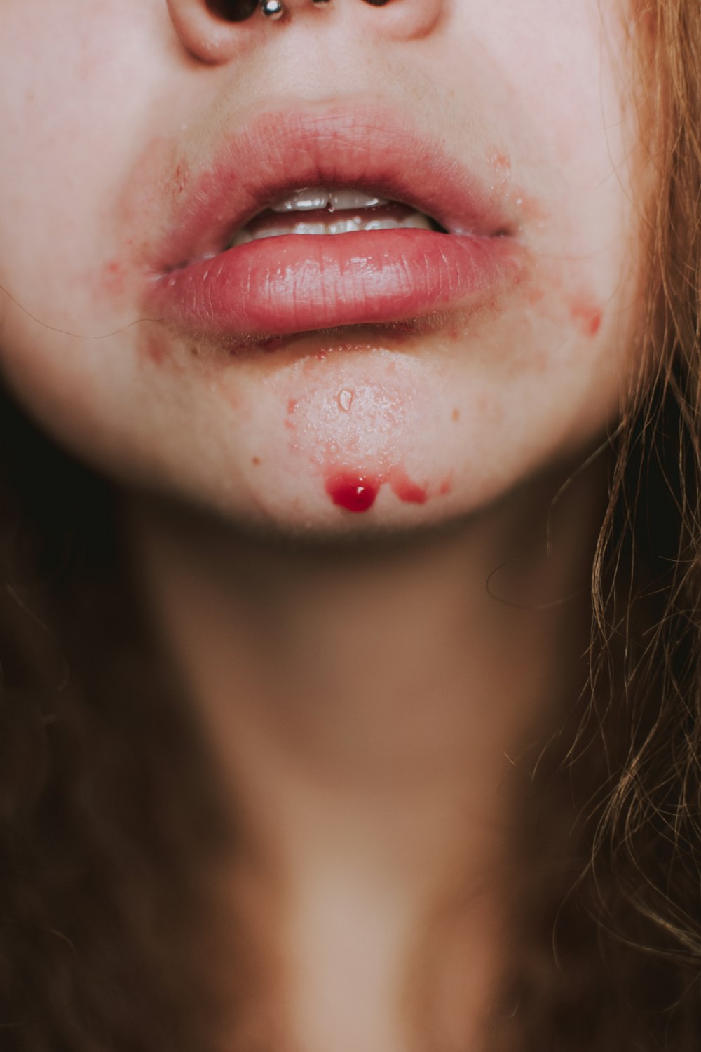 woman with red lipstick and red lipstick