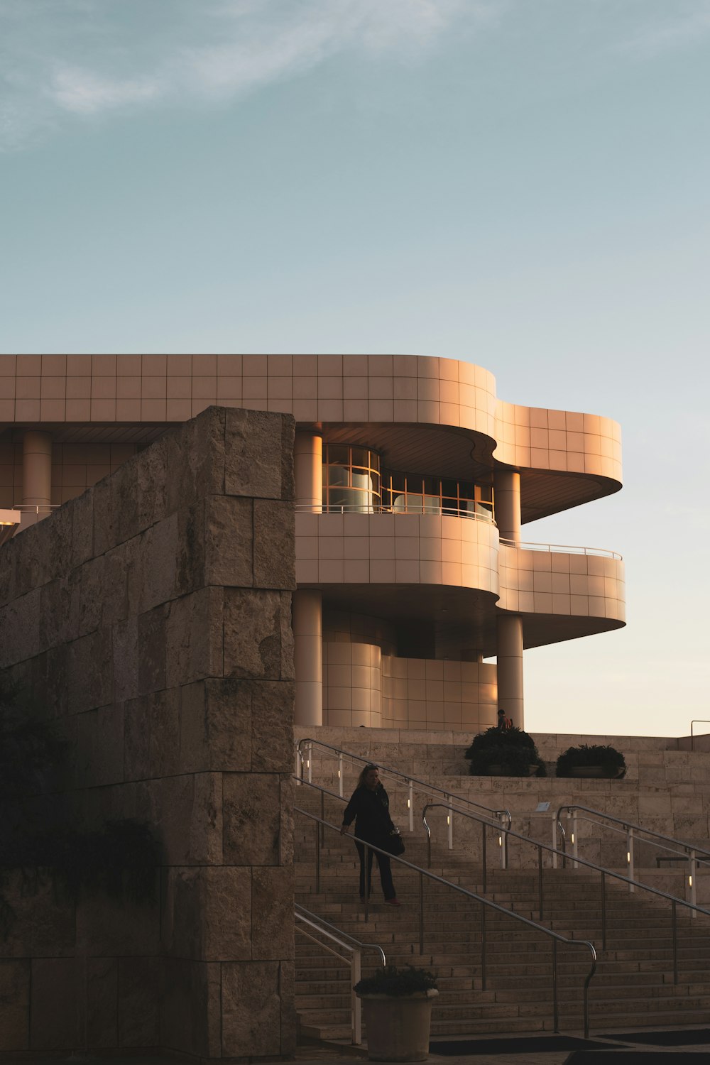 people walking on gray concrete stairs during daytime