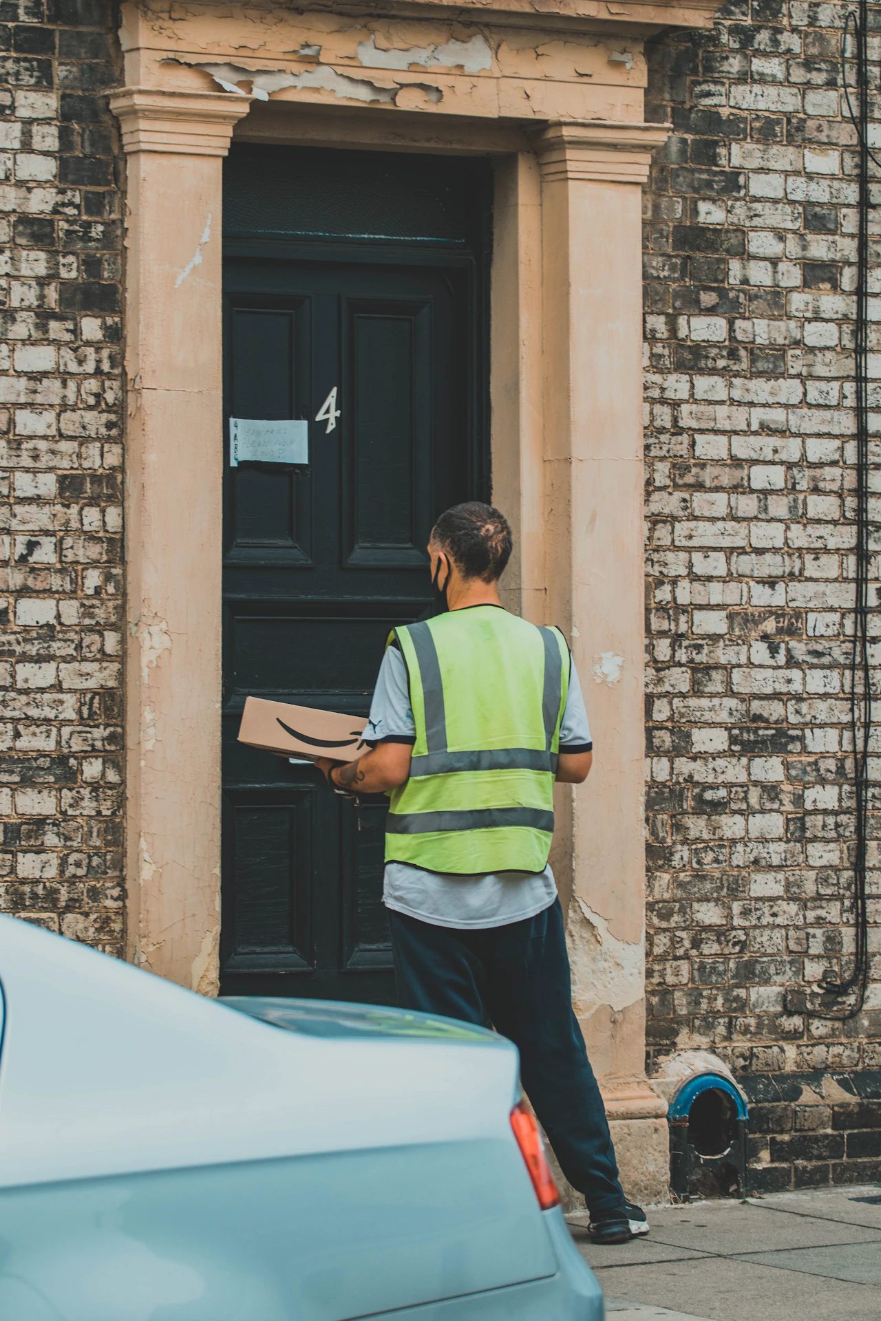 Customer checking an order status notification on a smartphone after an automated dispensary fulfillment update