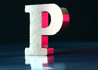 brown and red cross with white background