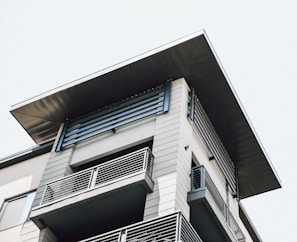 A completed flat roof on a commercial building, showcasing clean lines and durable materials.