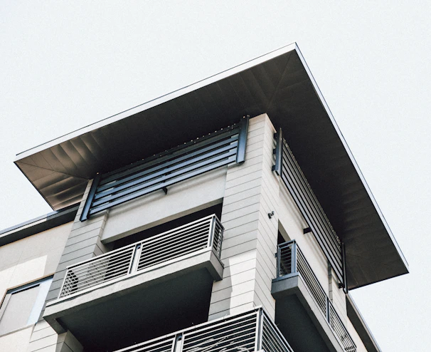 Contemporary urban residential building featuring clean lines and balconies in İzmir.