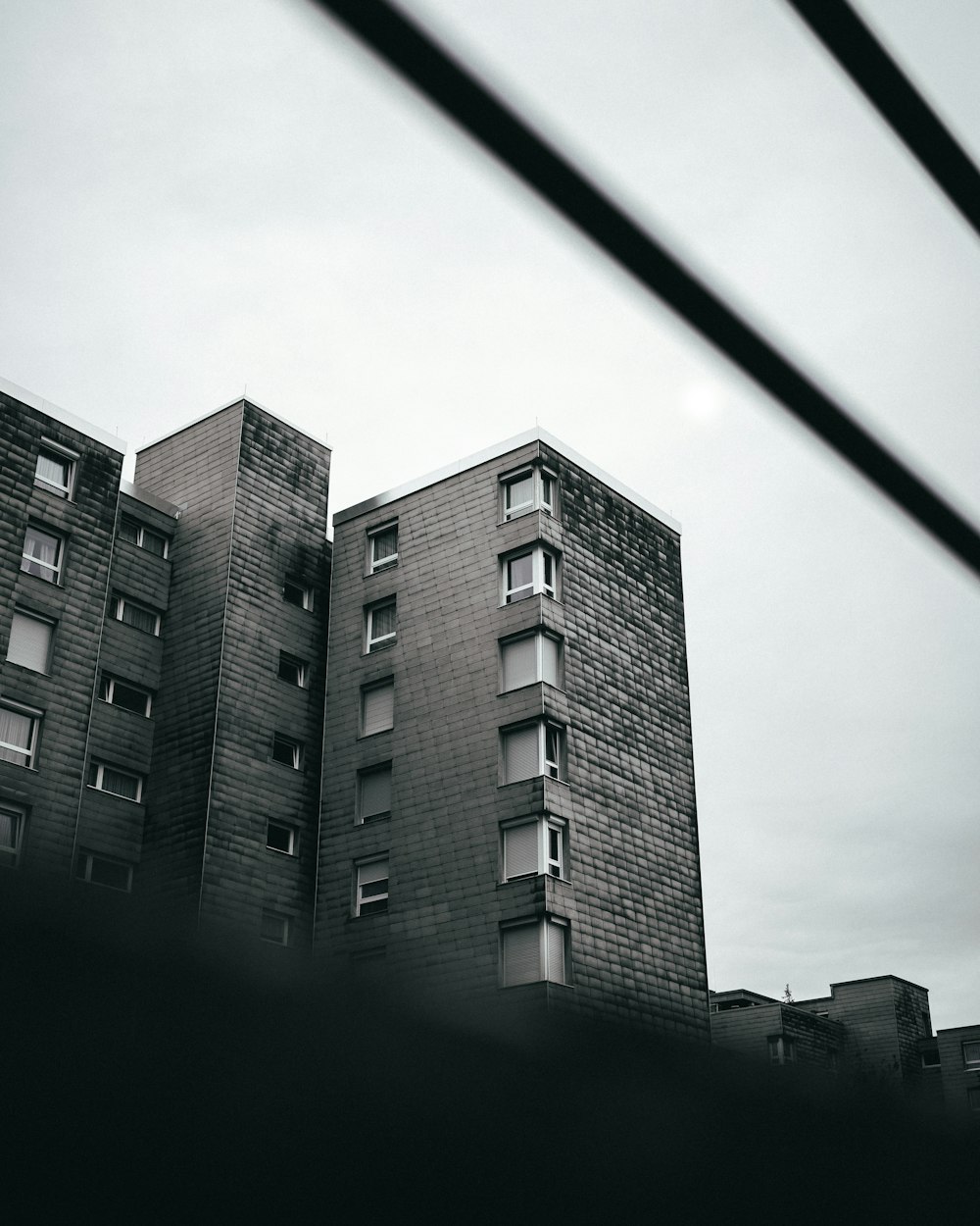 grayscale photo of high rise building