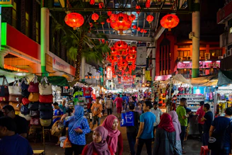 people walking on street during nighttime