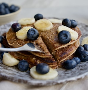 brown bread with blue berries on top