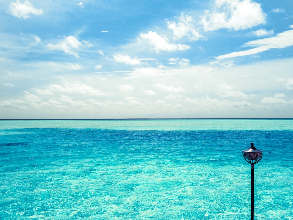 blue sea under blue sky during daytime