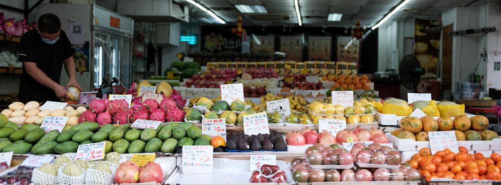 green and red apples on white plastic container