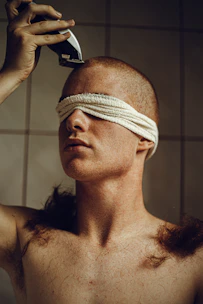 a man with a bandage around his head