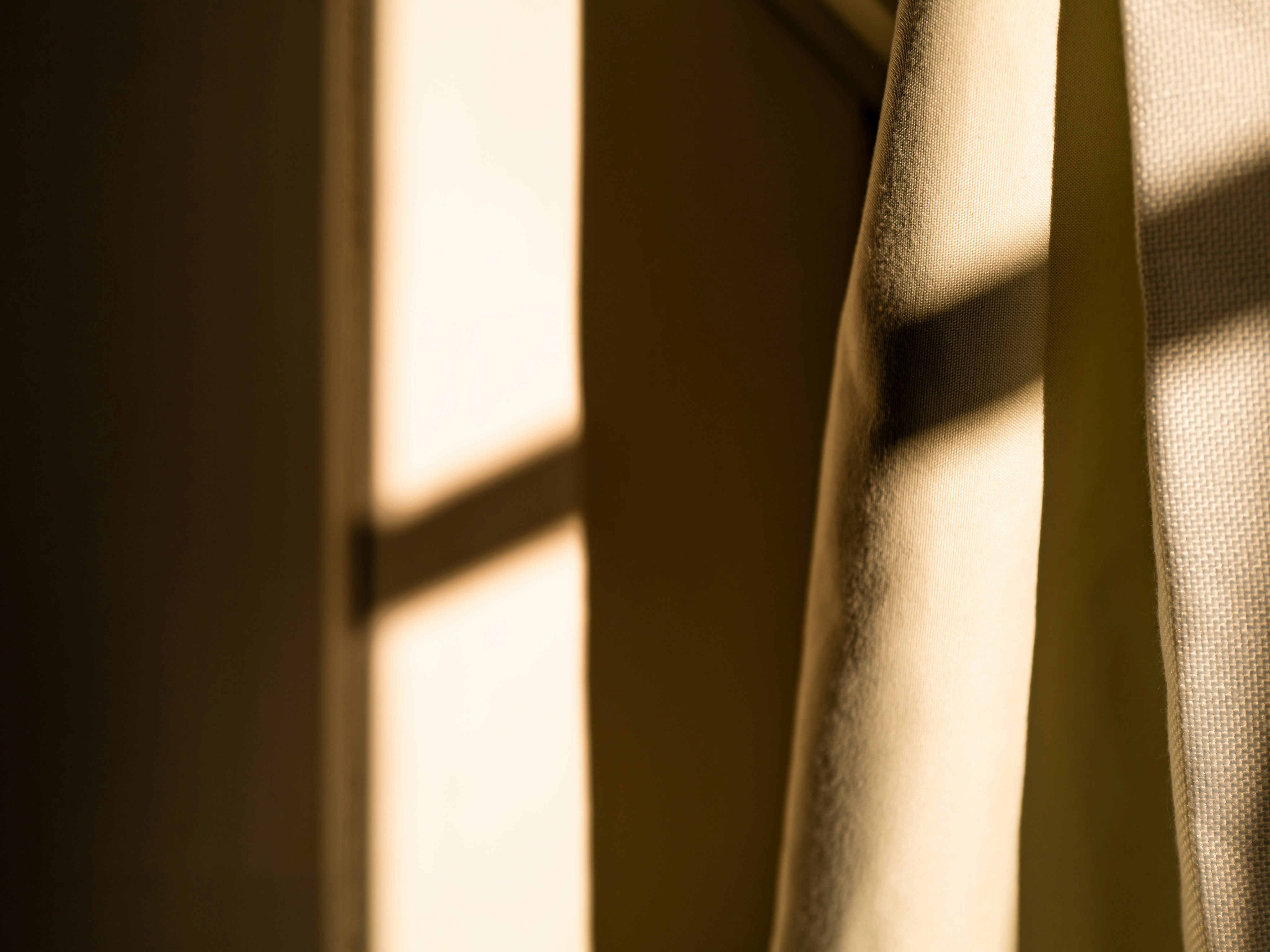 white textile on brown wooden door