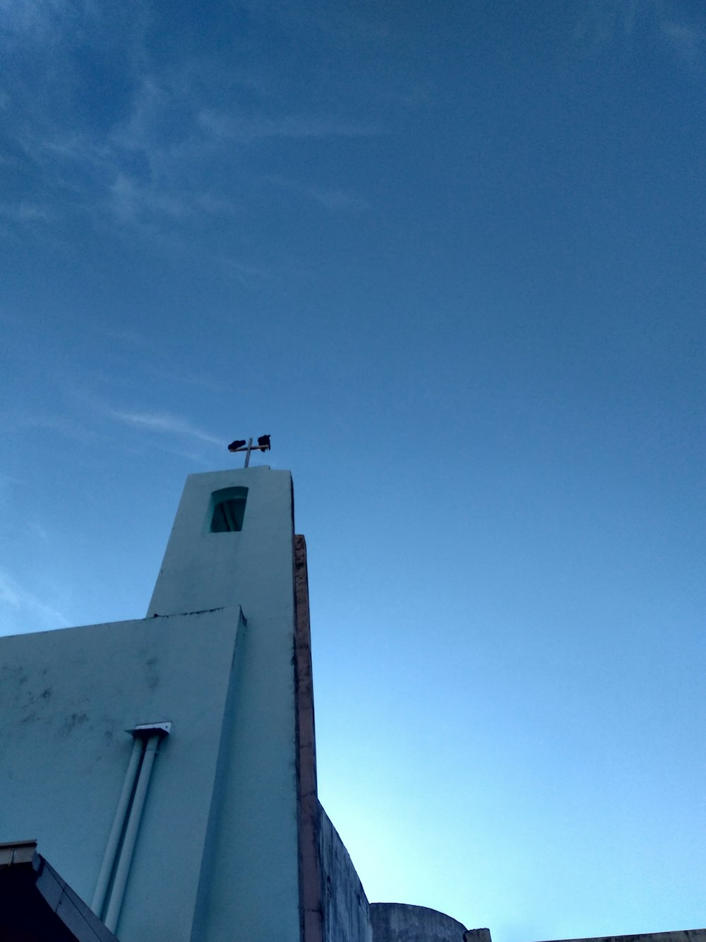 white concrete building under blue sky during daytime