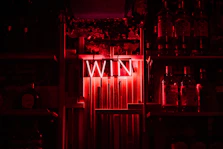 red and white neon light signage