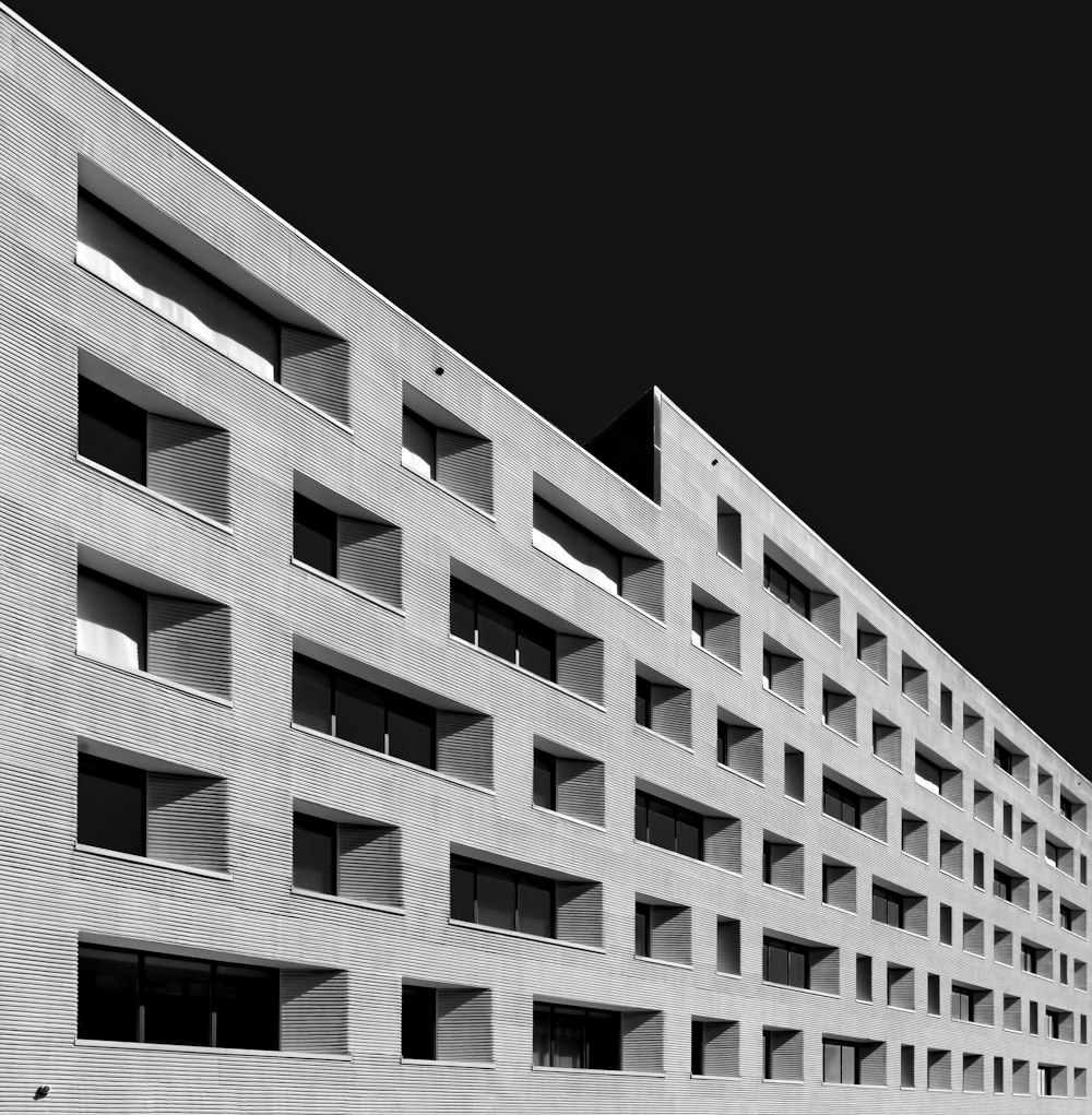 grayscale photo of concrete building