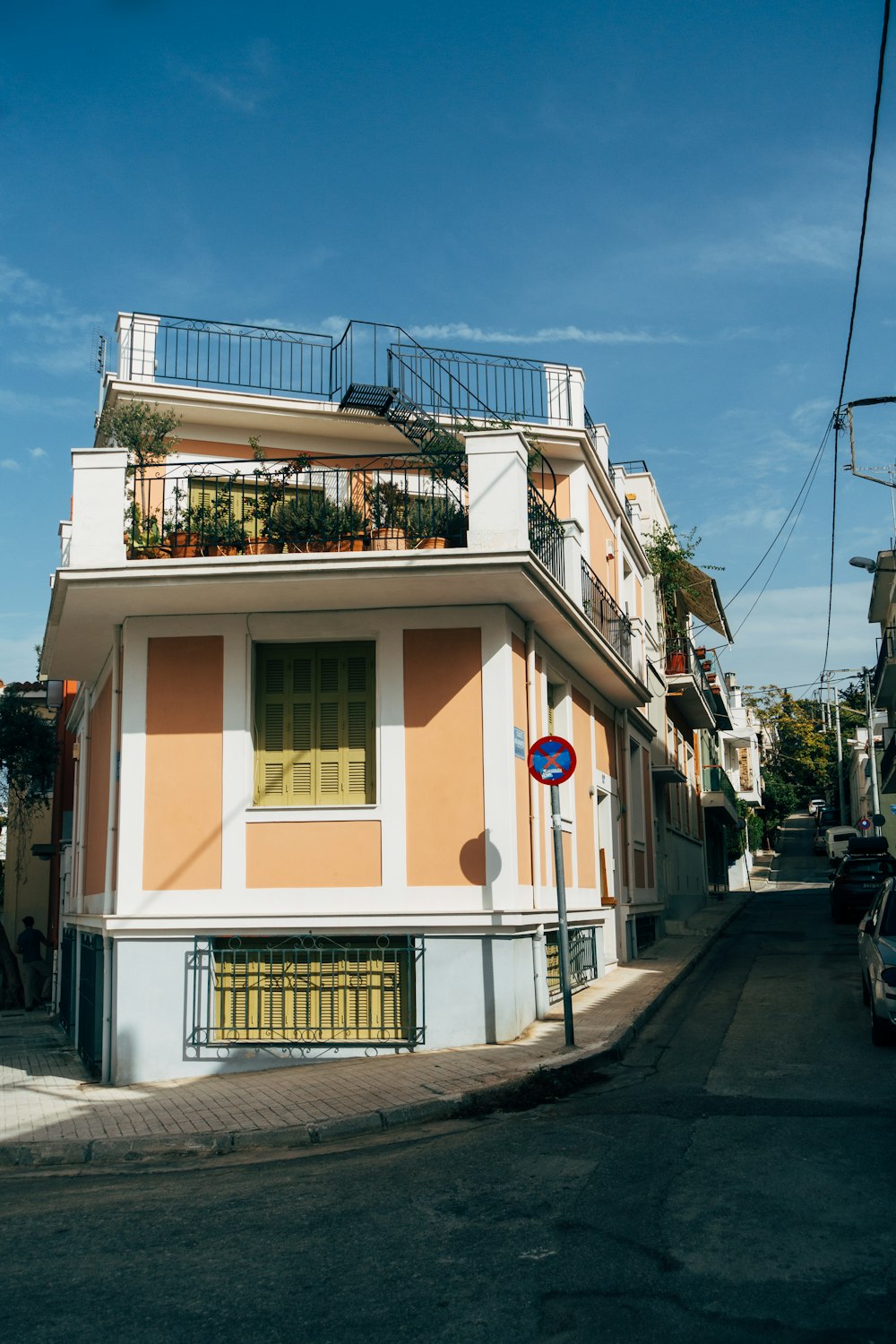 white and yellow concrete house