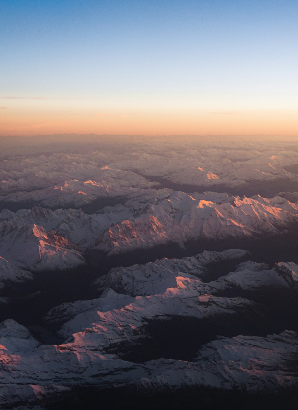 black and brown mountains under blue sky during daytime