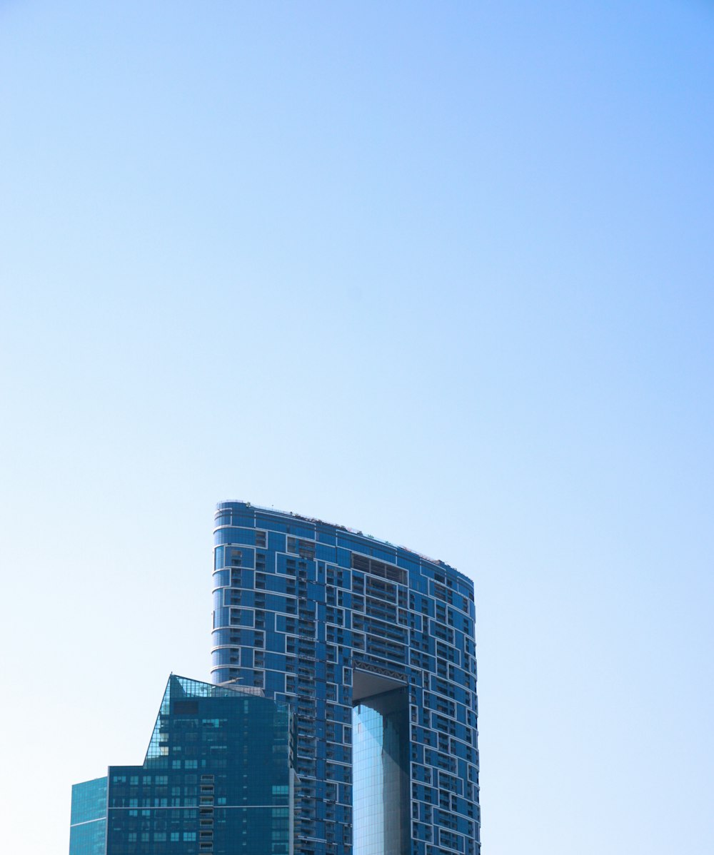 gray concrete building under blue sky during daytime