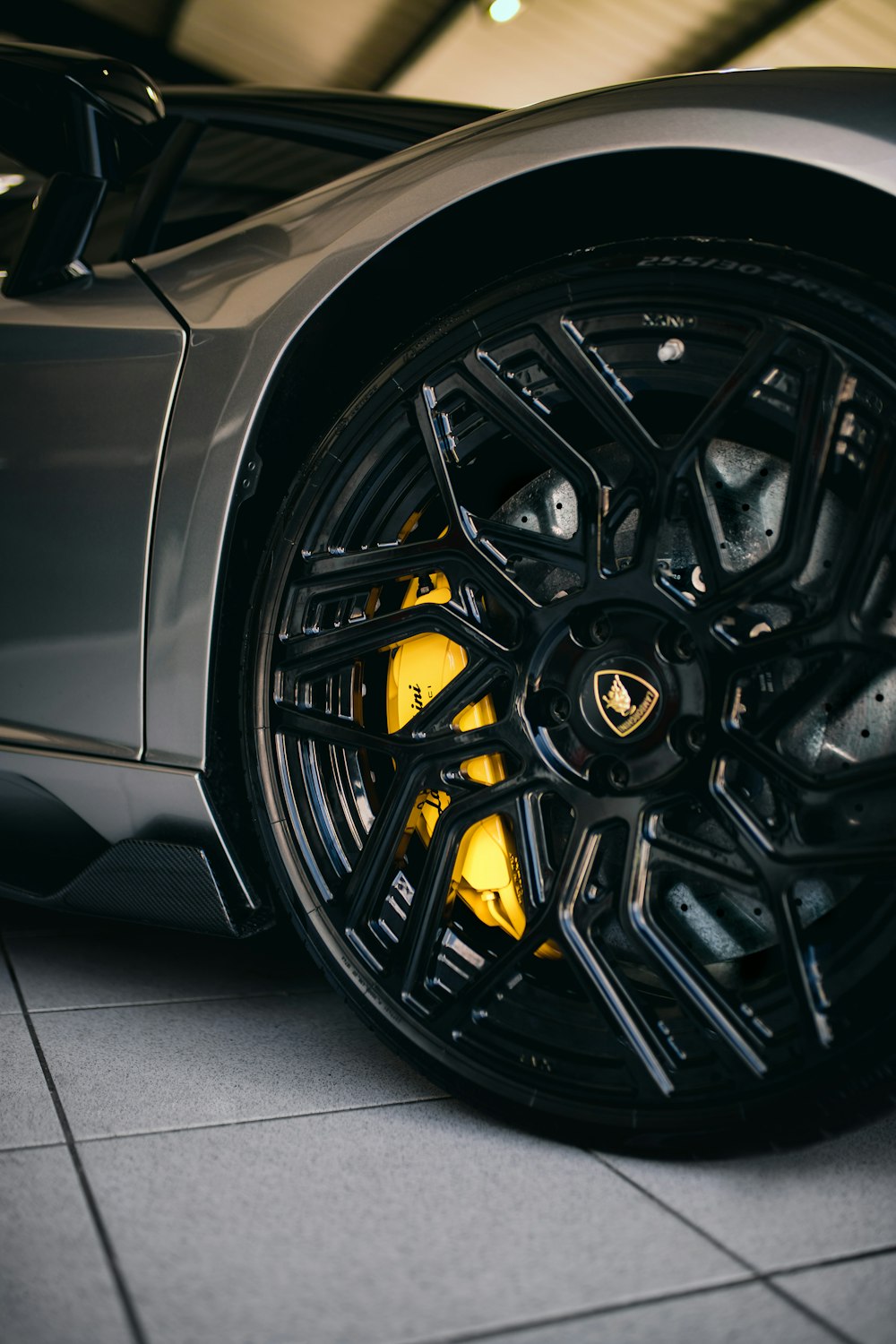 black and yellow wheel on black surface