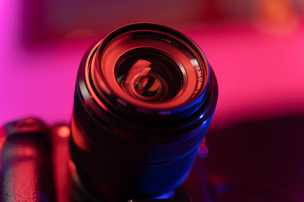 Macro of a camera lens under red light