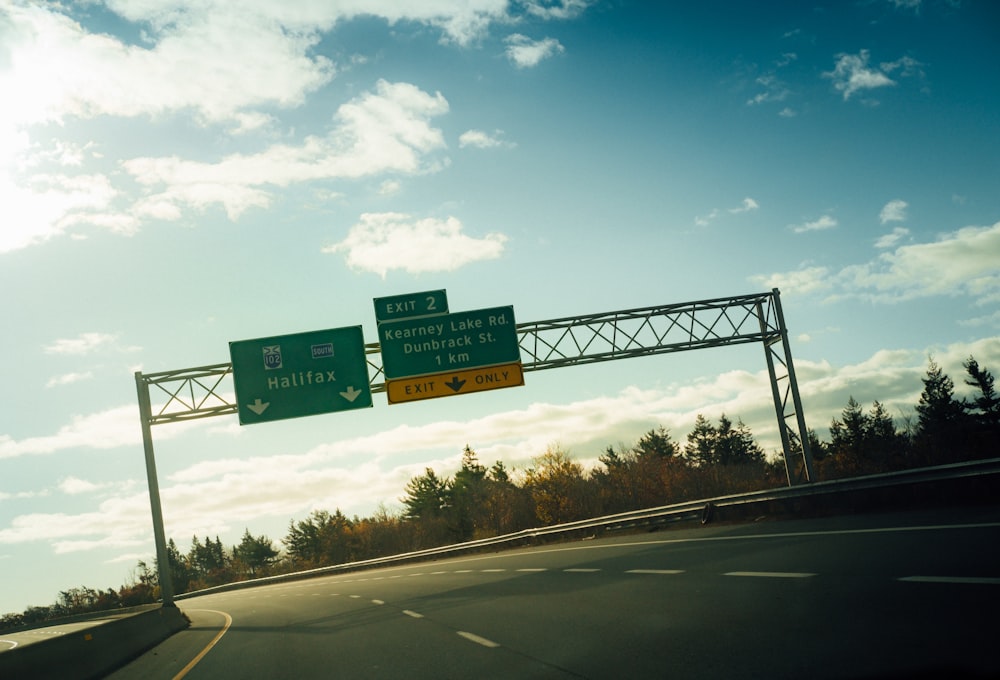 green and white road sign