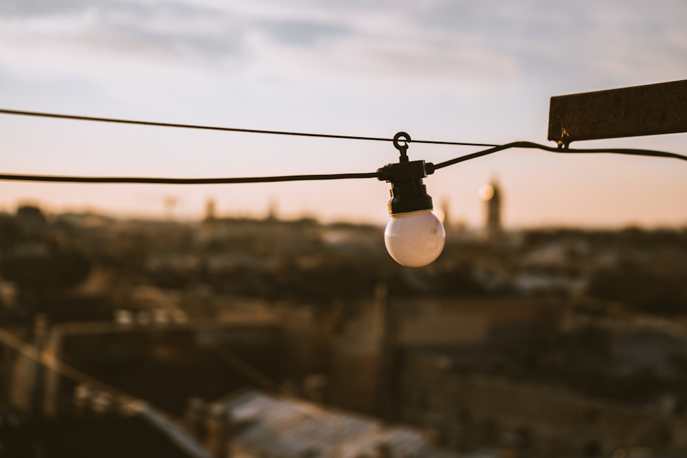 white light bulb during daytime