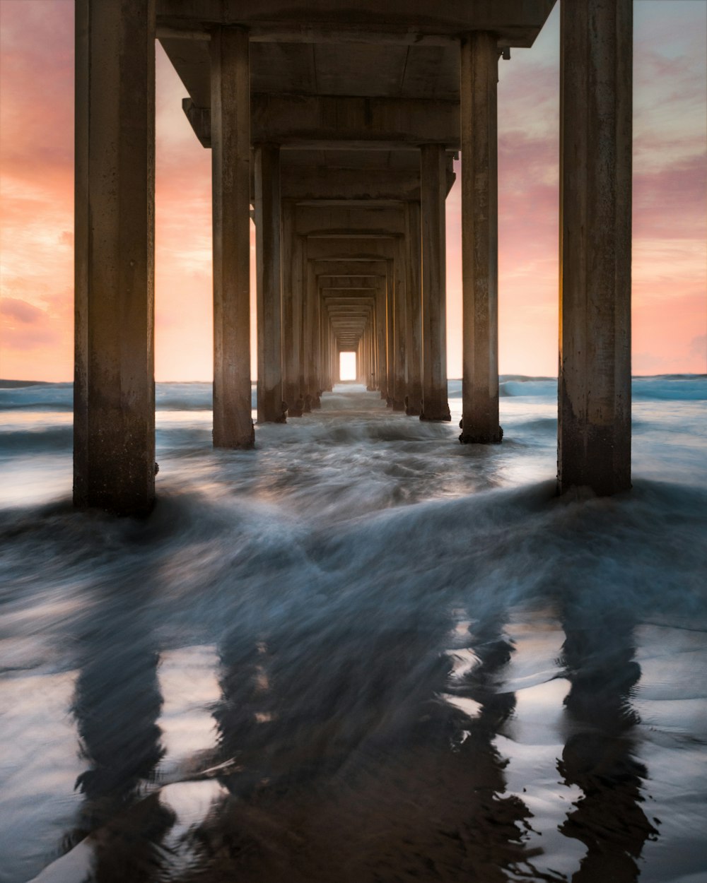 brown wooden dock on water