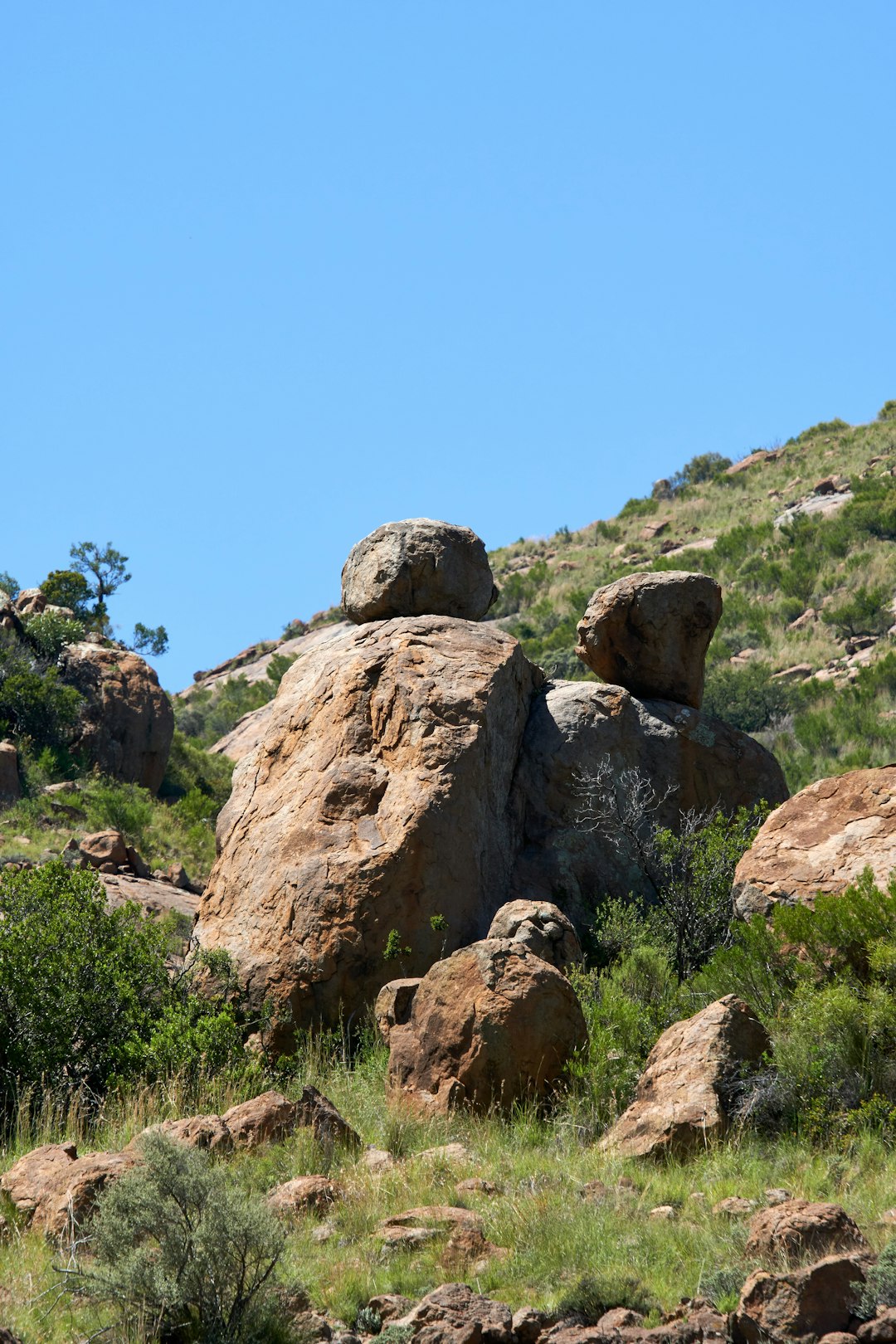 brown rock formation under blue sky during daytime