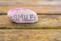 white and purple heart shaped stone