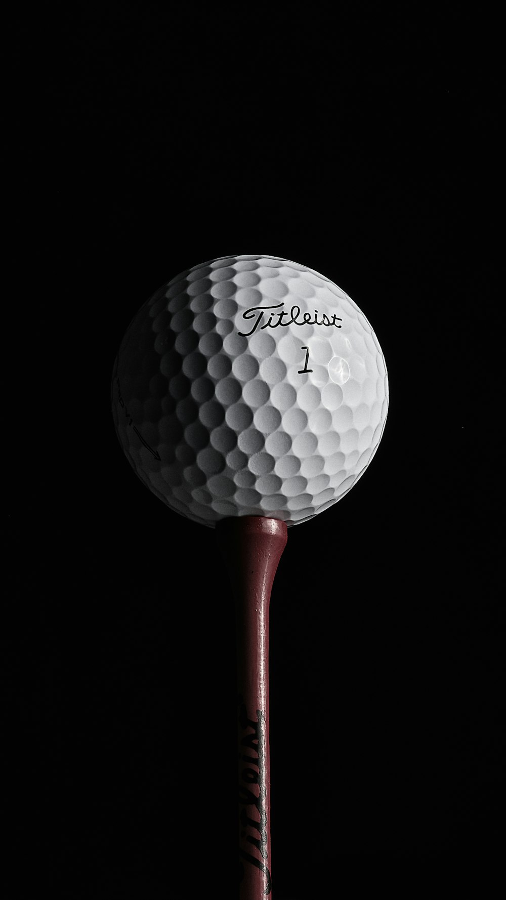 red and white golf ball