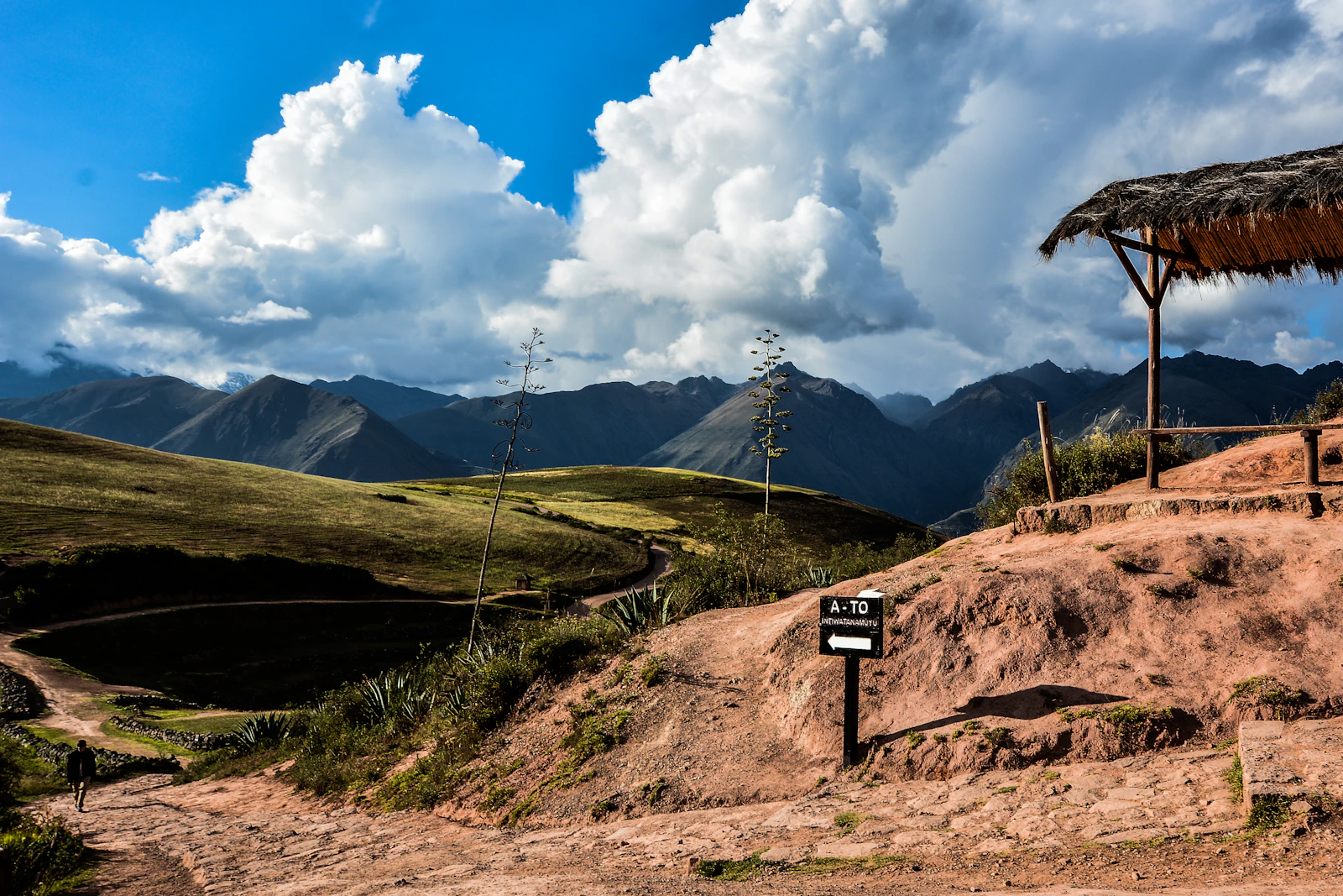 A rural track and mountain landscape in the Cusco region