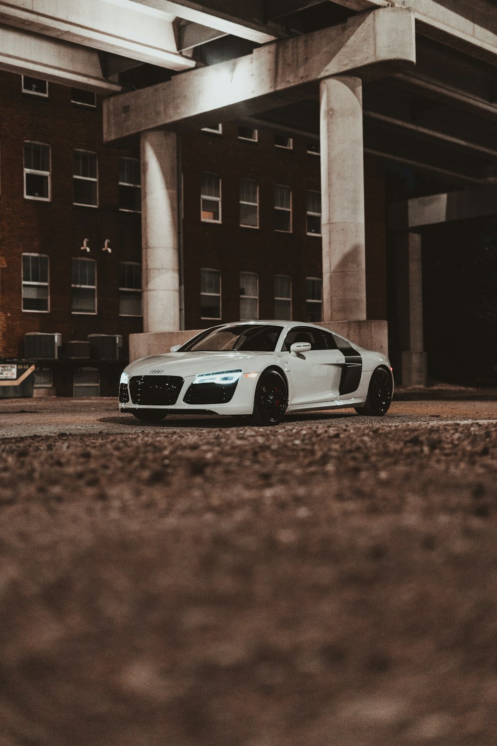 white bmw m 3 coupe parked on side of road