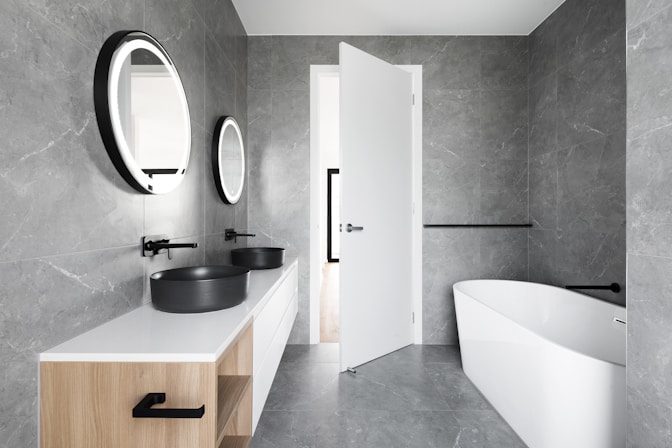 Very Modern bathroom in gray and white with black fixtures Sunnyvale Ca