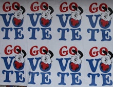 red blue and white hello kitty wall art