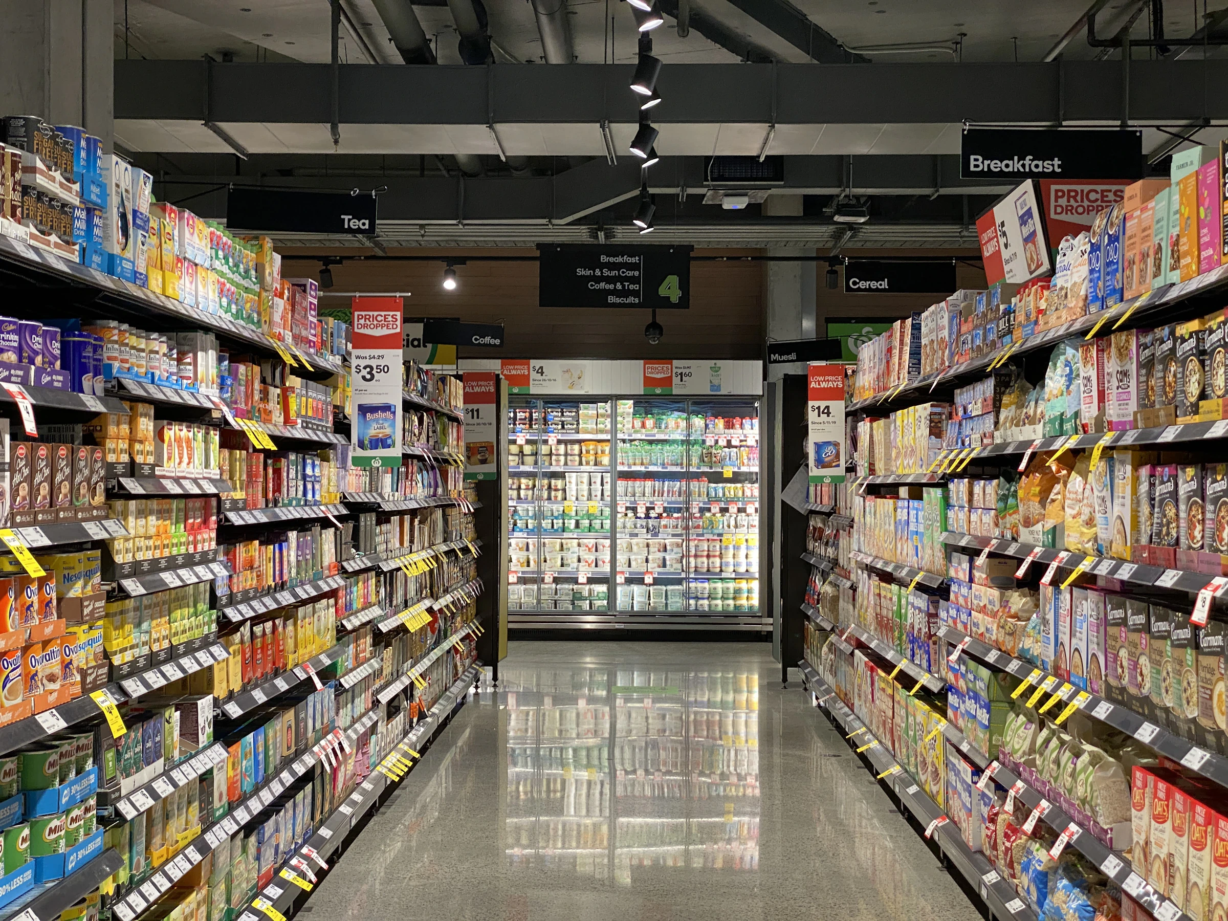 A modern stocked supermarket aisle
