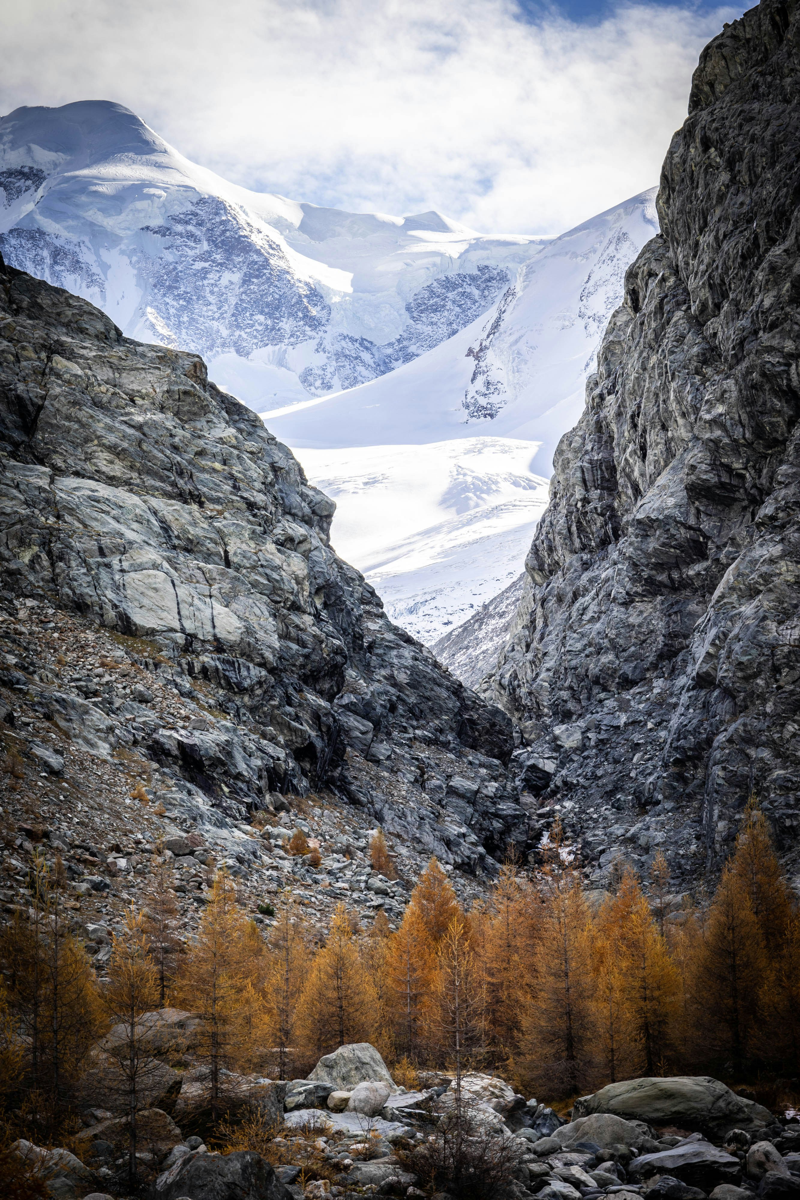 gray rocky mountain with snow