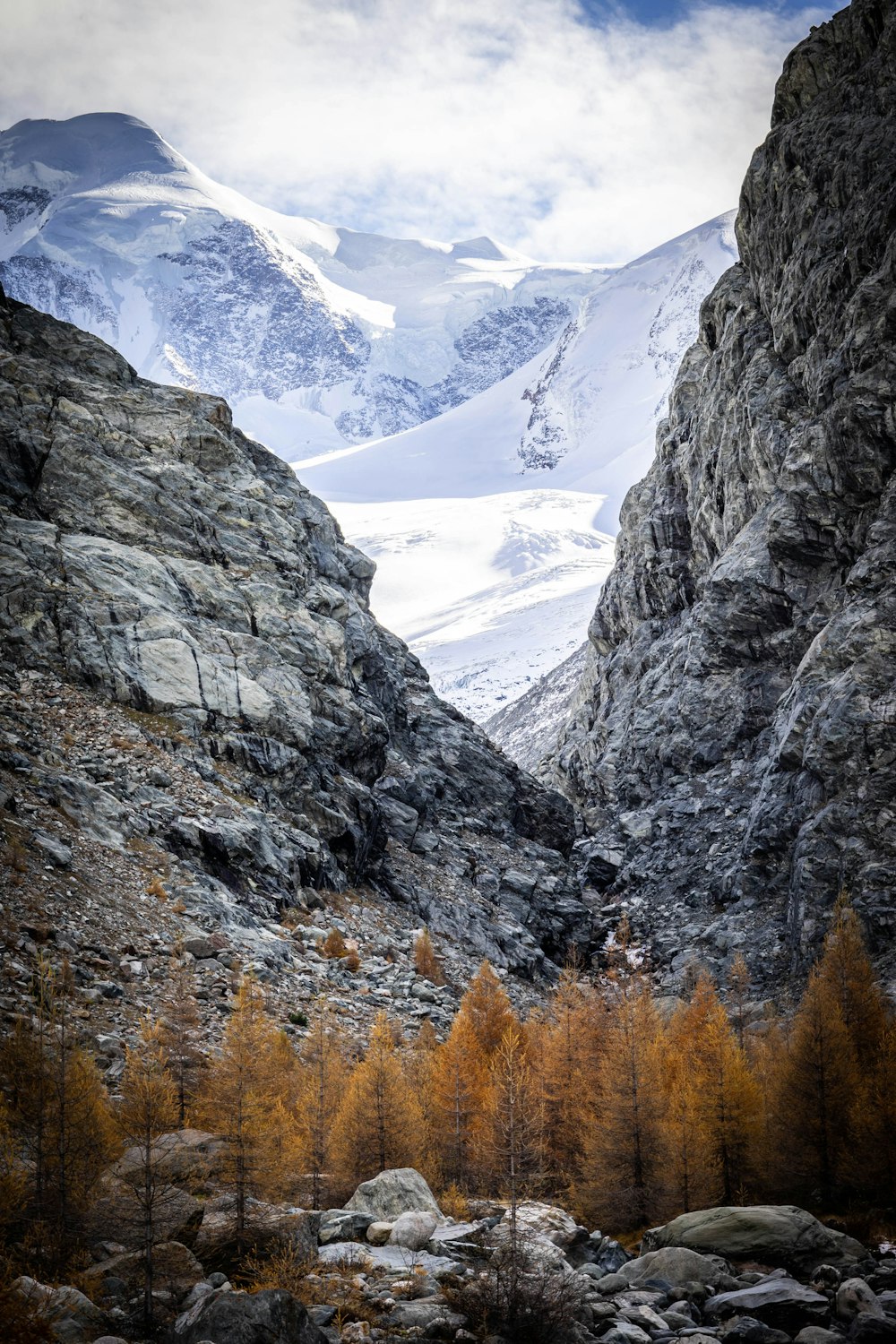 gray rocky mountain with snow