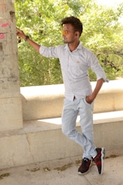 Model wearing a casual striped t-shirt outdoors