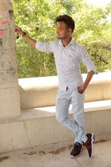 Model wearing a casual striped t-shirt outdoors