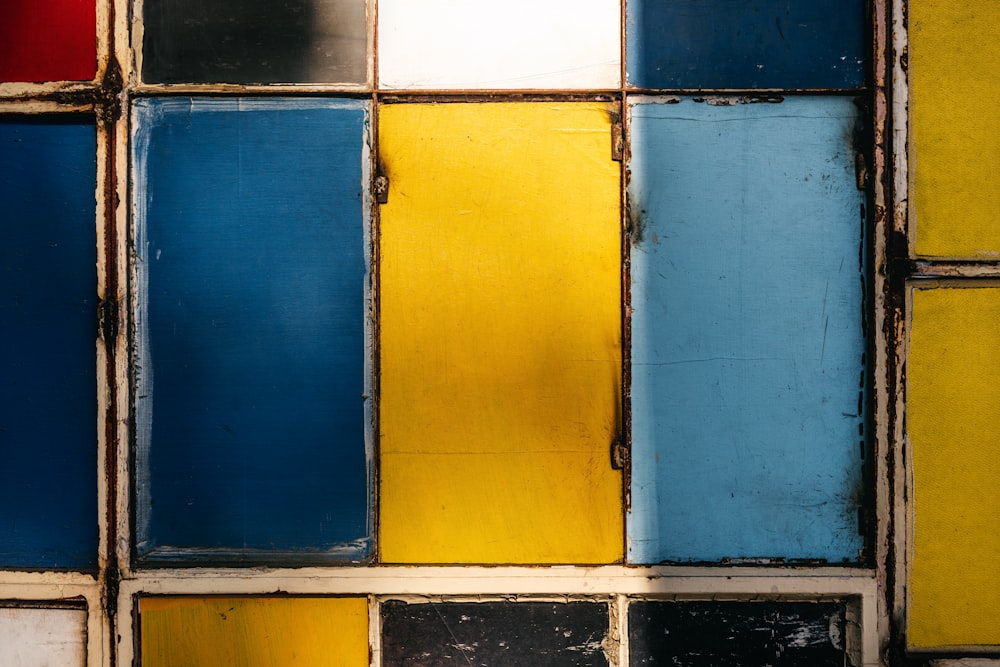 blue and yellow wooden cabinet