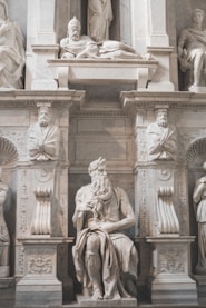 man and woman statue during daytime