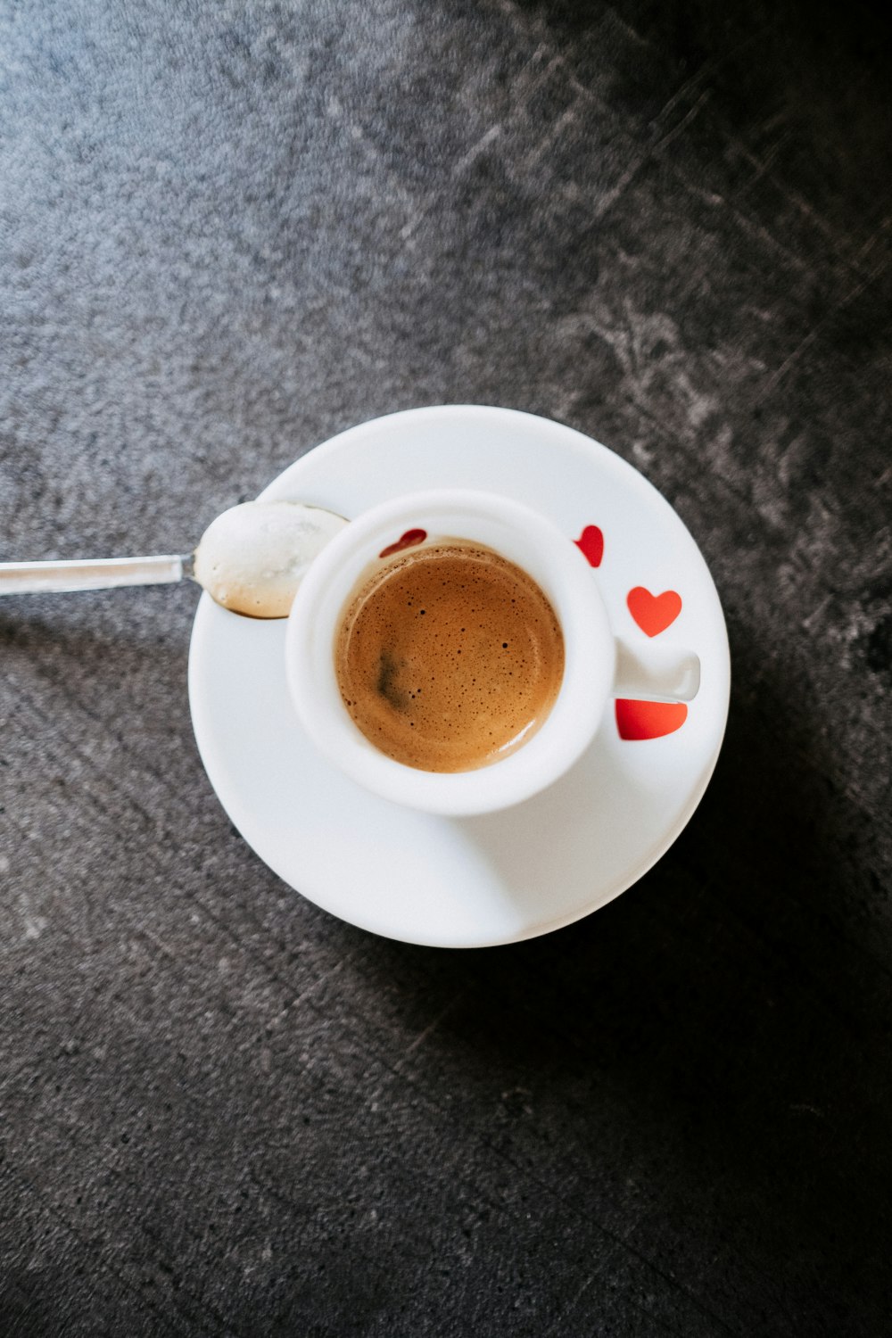 white ceramic mug with coffee