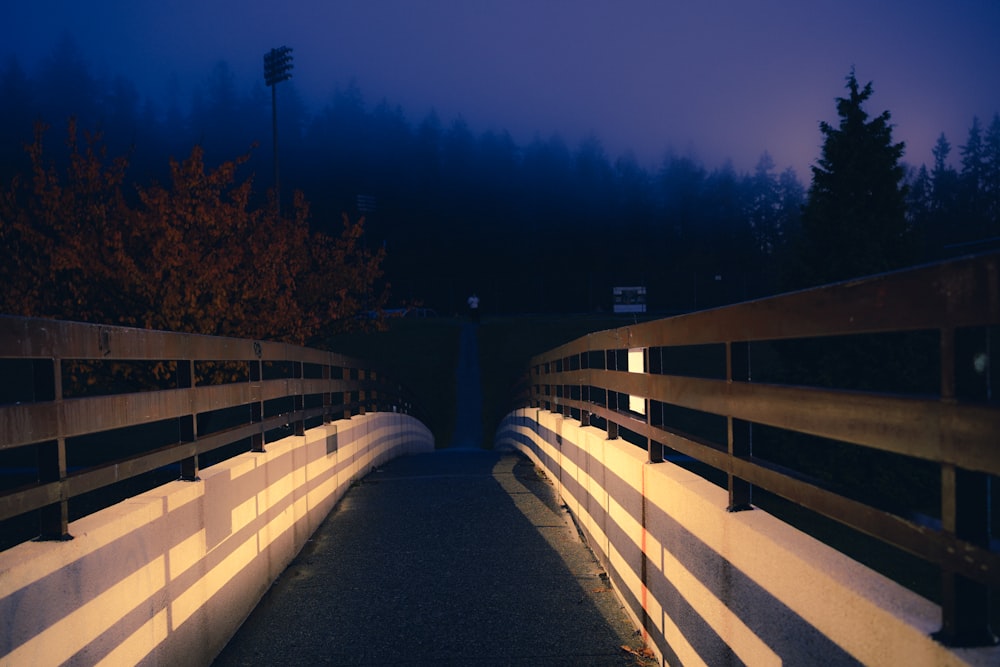 white wooden fence during night time