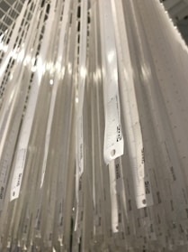 Different paper sizes displayed with a ruler for scale.