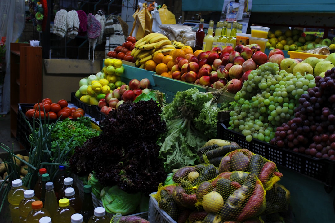 variety of fruits on green plastic crate, Food market