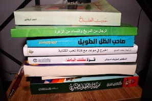 A stack of freshly signed books ready for readers at éditions du sahel event