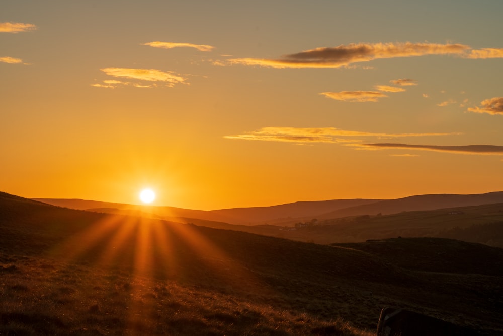 silhouette of mountain during sunset