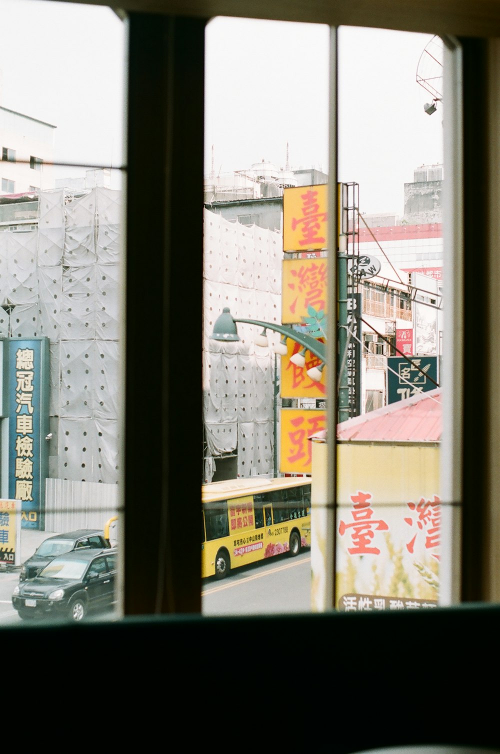 cars parked beside the building during daytime